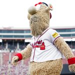 Braves Mascot's Playful Stunt Sparks Controversy: A Deep Dive into Mascot Interactions in Sports