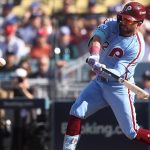 Phillies’ Kyle Schwarber’s Strategic Playoff Prep: Studying Football Tactics at CFP Semifinal